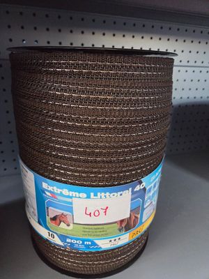 a roll of brown rope on a shelf in a store