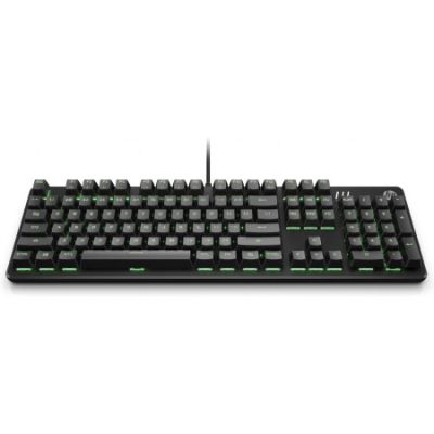 un gros plan d'un clavier posé sur une surface blanche