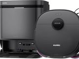 an image of a black and gray robot vacuum and a black and white machine