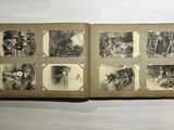 an open book with pictures of people and animals on it