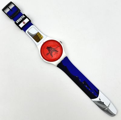 a watch with a ferrari logo on it on a white surface