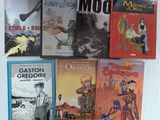 un grand nombre de livres posés sur une table