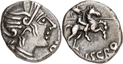 a silver coin with an image of a horse and rider on it