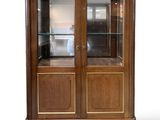 an image of a wooden display cabinet with glass doors
