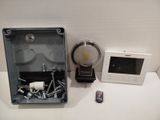 a picture of a radio and a remote control on a table