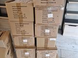 many boxes stacked on top of each other on the floor