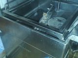 an image of a commercial kitchen with a deep fryer