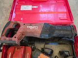an image of a red tool box with a hammer and other tools in it