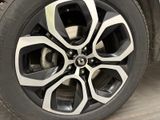 a close up view of a tire on a vehicle