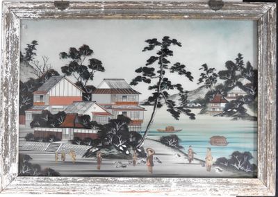 une photo d'une photo d'un village au bord de l'eau