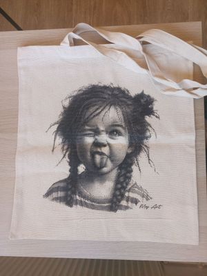 un sac sur lequel est représentée une vache