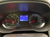 a close up of a car dashboard with a speedometer and gauges