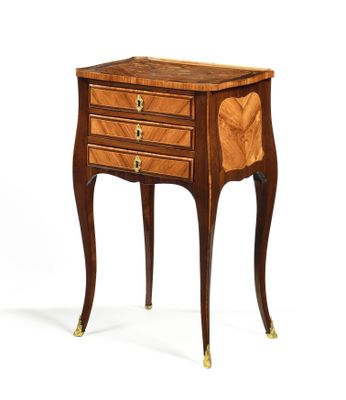 an image of a wooden table with drawers on it
