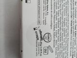 the back of a white box with a barcode on the side of it
