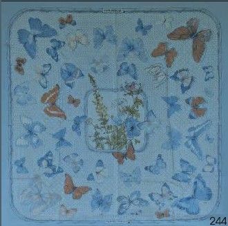 des papillons bleus et orange sur fond bleu, avec une bordure blanche