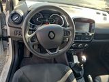 the interior of a car with a steering wheel and dashboard controls