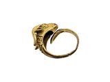 a close up of a gold ring with a skull on it