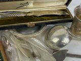 a box of silverware sitting on a table