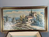 a picture of a painting in a box on a table