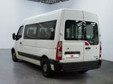 a white van that is parked in a room