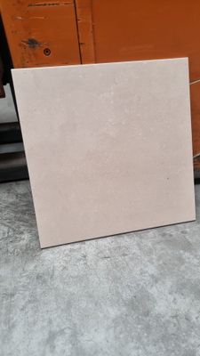 a close up of a piece of cardboard sitting on the ground