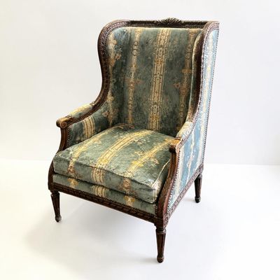 an image of a chair with a blue and green upholstered upholstered upholstered