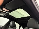 a view of the sunroof from inside of a car