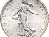 an image of a coin with a woman walking on it