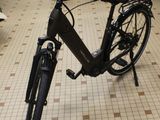 a bicycle that is sitting on the floor in a room