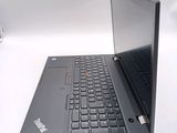 a laptop computer sitting on top of a white table
