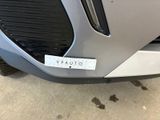 a close up of the front bumper of a car