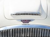 a close up of a car ' s grill and badge