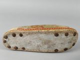 an old tinned box with rivets and rivets on it