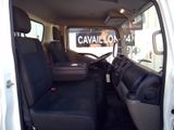 a white van with black seats in the back of it