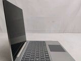 a laptop computer that is sitting on a table