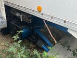 a truck that has been parked on the side of the road
