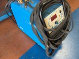 an image of a welding machine in a factory