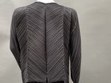 an image of a mannequin mannequin wearing a black top and black pants