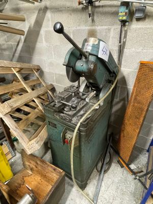 a machine that is sitting in a room with wood pallets