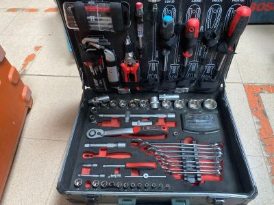 many tools in a tool case on the floor