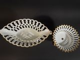 a white bowl with a gold rim and a white bowl with a gold rim
