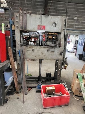 a large machine that is sitting in a garage