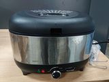 an image of a crock pot sitting on a table