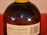 a bottle of liquor sitting on a table with a barcode on it