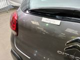 a car that has a sticker on the back of it