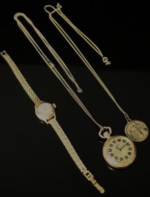 three different types of watches and chains on a black surface
