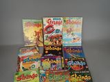 several children ' s books are stacked on top of each other