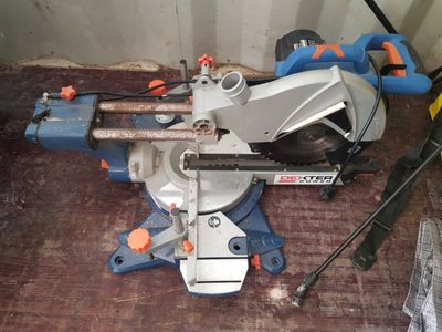 a picture of a circular saw on a wooden floor