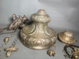 a lot of antique items that are on the table
