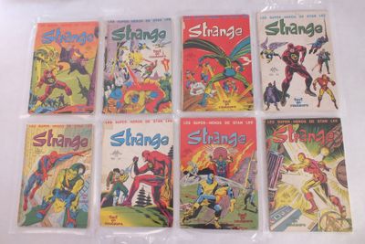 six bandes dessinées vintage différentes, dans des sachets en plastique, posées sur une surface blanche
